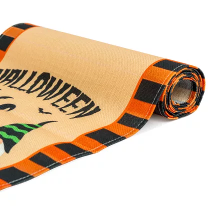 GLOBIZ 56595B Halloween-i dekoráció - asztalterítő futó - halloween-i motívumokkal - 184 x 33 cm GLOBIZ 56595B Halloween-i dekoráció - asztalterítő futó - halloween-i motívumokkal - 184 x 33 cm